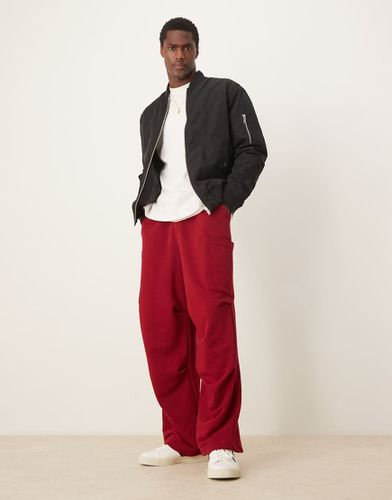 Joggers rossi oversize stile cargo con gamba a palloncino - ASOS DESIGN - Modalova