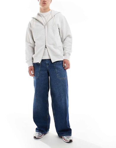 Jean ultra baggy avec poches latérales - foncé délavé - Asos Design - Modalova