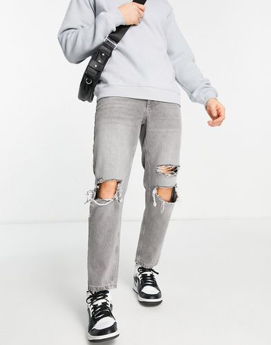 Jeans classici rigidi slavato con strappi vistosi sulle ginocchia - ASOS DESIGN - Modalova