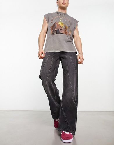 Jeans a zampa ampi lavaggio nero con pannelli - ASOS DESIGN - Modalova