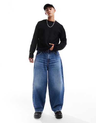 Jeans a palloncino oversize lavaggio chiaro con tinta - ASOS DESIGN - Modalova