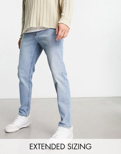 Jeans affusolati lavaggio chiaro - ASOS DESIGN - Modalova