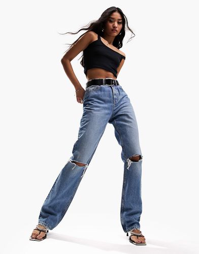 Jeans dritti anni '90 medio con strappi sulle ginocchia - ASOS DESIGN - Modalova