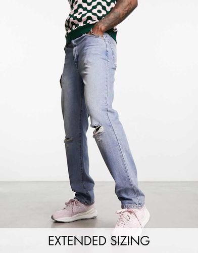 Jeans dritti lavaggio medio con strappi sulle ginocchia - ASOS DESIGN - Modalova