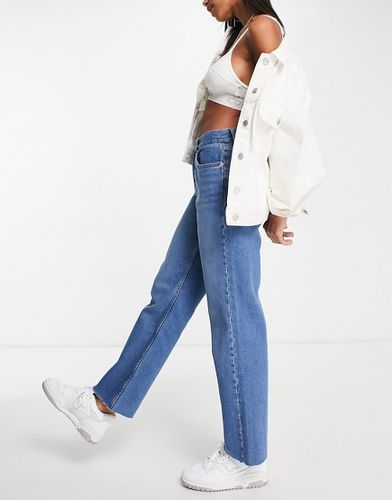 Jeans dritti stile anni '90 medio con fondo grezzo - ASOS DESIGN - Modalova