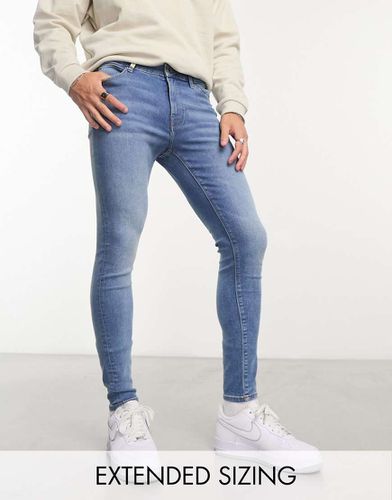 Jeans power stretch lavaggio chiaro - ASOS DESIGN - Modalova