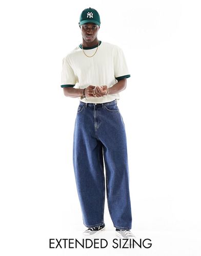 Jeans a palloncino oversize lavaggio medio - ASOS DESIGN - Modalova