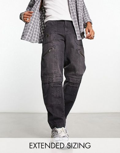 Jeans larghi multitasche con zip nero slavato - ASOS DESIGN - Modalova