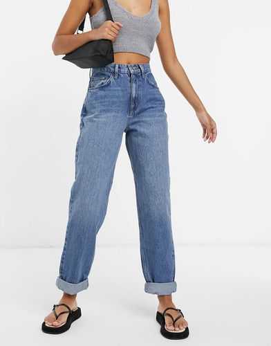 Mom jeans a vita alta extra larghi lavaggio medio - ASOS DESIGN - Modalova