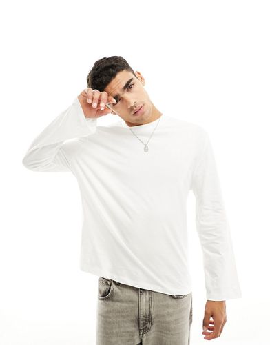 Maglietta comoda a maniche lunghe bianca - ASOS DESIGN - Modalova