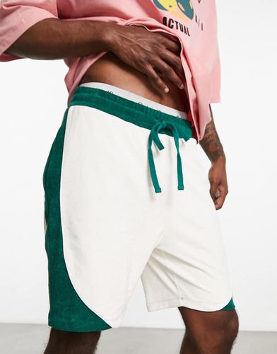 Pantaloncini oversize in spugna bianco sporco con pannello a contrasto - ASOS DESIGN - Modalova