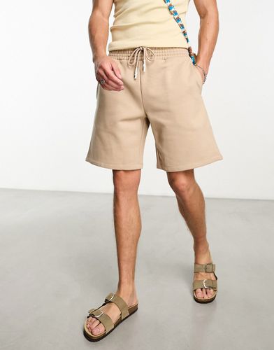 Pantaloncini oversize pesanti in jersey beige - ASOS DESIGN - Modalova