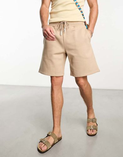 Pantaloncini oversize pesanti in jersey beige - ASOS DESIGN - Modalova