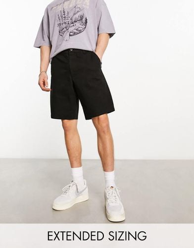 Pantaloncini chino skater comodi taglio lungo neri - ASOS DESIGN - Modalova