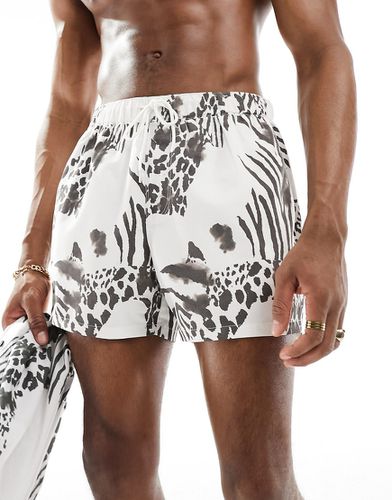 Pantaloncini da bagno corti con stampa zebrata neri e bianchi - ASOS DESIGN - Modalova