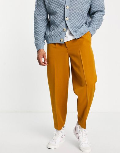 Pantaloni oversize eleganti affusolati color cammello - ASOS DESIGN - Modalova