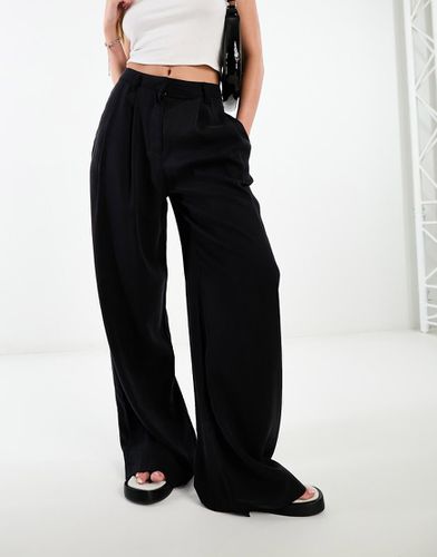 Pantaloni a fondo ampio casual neri - ASOS DESIGN - Modalova