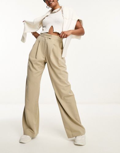 Pantaloni a fondo ampio a pieghe beige - ASOS DESIGN - Modalova