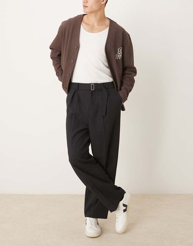 Pantaloni a fondo ampio eleganti con cintura e pieghe sul davanti neri - ASOS DESIGN - Modalova