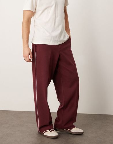 Pantaloni a fondo ampio eleganti bordeaux con profili laterali - ASOS DESIGN - Modalova