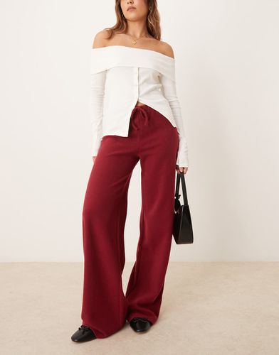 Pantaloni a fondo ampio spazzolati bordeaux in coordinato - ASOS DESIGN - Modalova