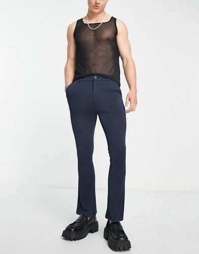 Pantaloni a zampa super skinny plissé - ASOS DESIGN - Modalova