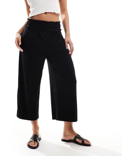 Pantaloni culotte taglio corto con vita arricciata neri - ASOS DESIGN - Modalova