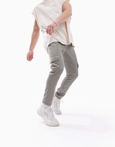Pantaloni cargo skinny kaki chiaro con fondo elasticizzato - ASOS DESIGN - Modalova