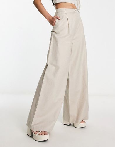 Pantaloni con fondo ampio a vita alta color pietra - ASOS DESIGN - Modalova
