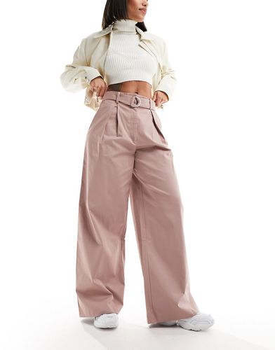 Pantaloni con fondo ampio e anello a D color visone - ASOS DESIGN - Modalova
