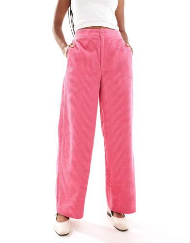 Pantaloni con gamba bombata in tessuto a coste rosa - ASOS DESIGN - Modalova