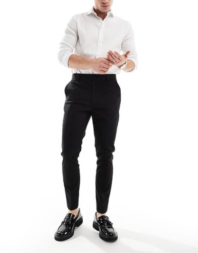 Pantaloni crop eleganti skinny neri - ASOS DESIGN - Modalova