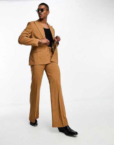 Pantaloni da abito a zampa color tabacco con tasche sul davanti - ASOS DESIGN - Modalova