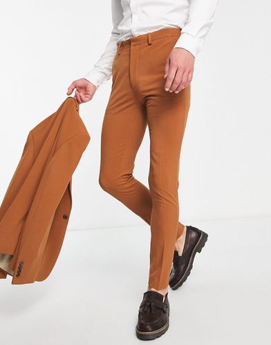 Pantaloni da abito super skinny color tabacco - ASOS DESIGN - Modalova
