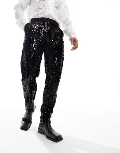 Pantaloni da abito slim neri con paillettes sparse - ASOS DESIGN - Modalova