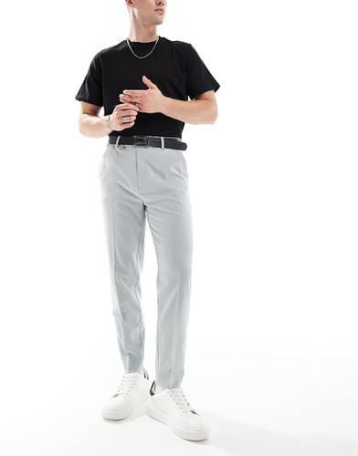 Pantaloni eleganti affusolati chiaro con risvolti - ASOS DESIGN - Modalova