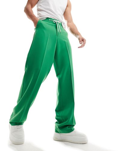 Pantaloni eleganti con fondo ampio verdi - ASOS DESIGN - Modalova