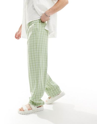 Pantaloni eleganti verdi a quadretti a fondo ampio - ASOS DESIGN - Modalova