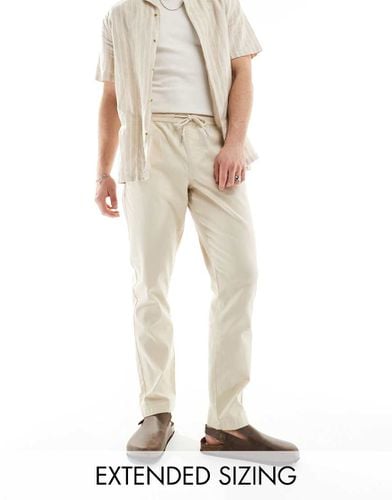 Pantaloni slim beige - ASOS DESIGN - Modalova