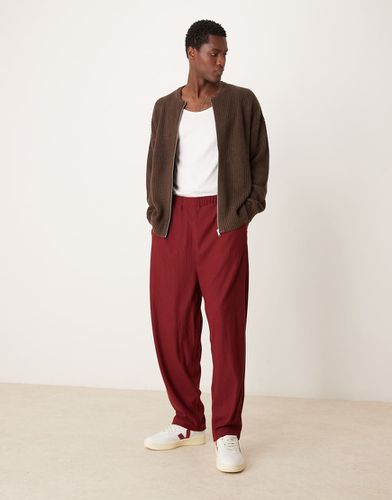 Pantaloni sportivi super ampi bordeaux - ASOS DESIGN - Modalova