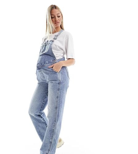 ASOS DESIGN Premaman - Salopette di jeans medio - ASOS Maternity - Modalova