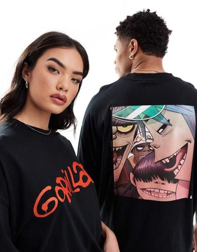 T-shirt unisex oversize nera con stampe della band "Gorillaz" su licenza - ASOS DESIGN - Modalova