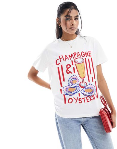 T-shirt vestibilità classica bianca con stampa di champagne e ostriche - ASOS DESIGN - Modalova