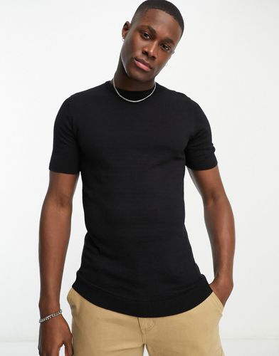T-shirt attillata leggera in maglia nera di cotone - ASOS DESIGN - Modalova