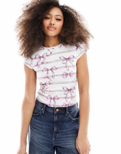 T-shirt baby bianca con grafica a fiocco - ASOS DESIGN - Modalova