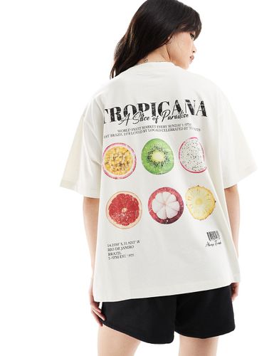 T-shirt boyfriend color crema con stampa Tropicana sul retro - ASOS DESIGN - Modalova
