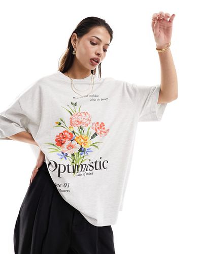 T-shirt boyfriend color ghiaccio mélange con grafica "Botanical optimistic" - ASOS DESIGN - Modalova