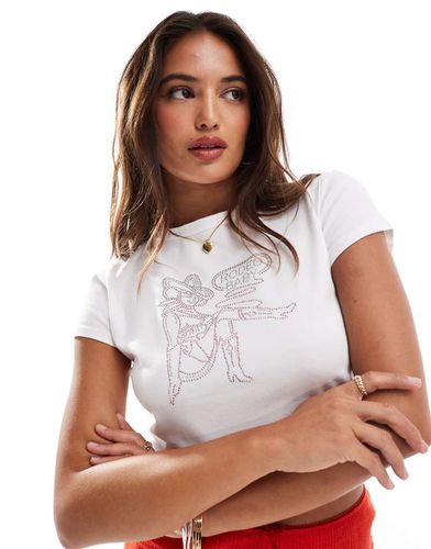 T-shirt corta bianca con grafica con applicazioni a caldo a tema rodeo - ASOS DESIGN - Modalova