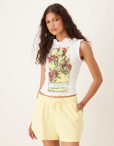 T-shirt froncé à imprimé Pomerante graphique - Asos Design - Modalova