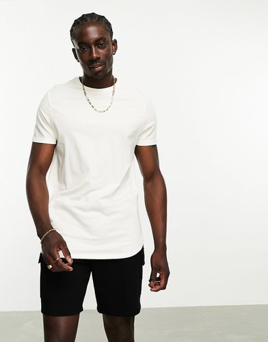 T-shirt lunga color crema con spacchetti laterali - ASOS DESIGN - Modalova